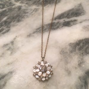 Gold necklace with pretty tan design